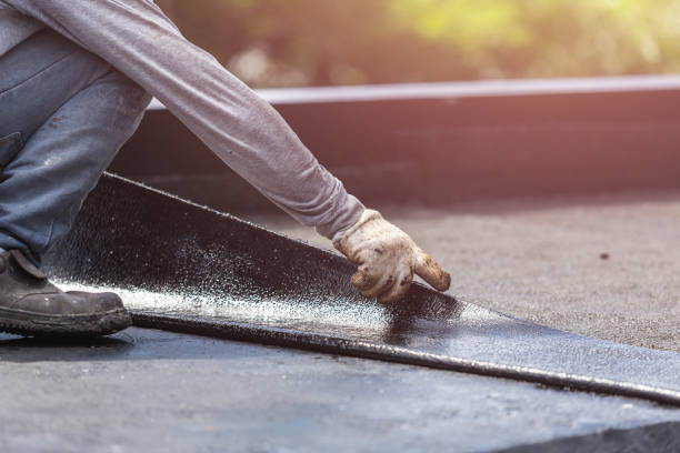 Professional Basement Waterproofing technician working in Riceville, TN